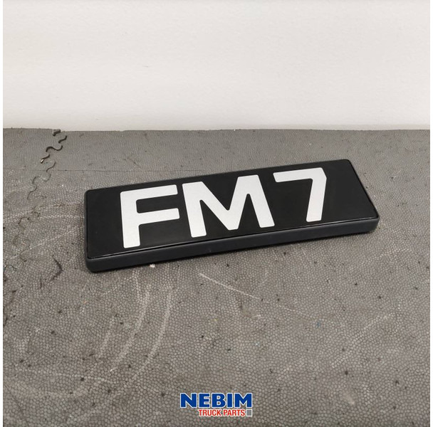Volvo Volvo - 20360070 - Embleem FM7 - Piesă de schimb pentru Camion: Foto 1 Volvo Volvo - 20360070 - Embleem FM7 - Piesă de schimb pentru Camion: Foto 1