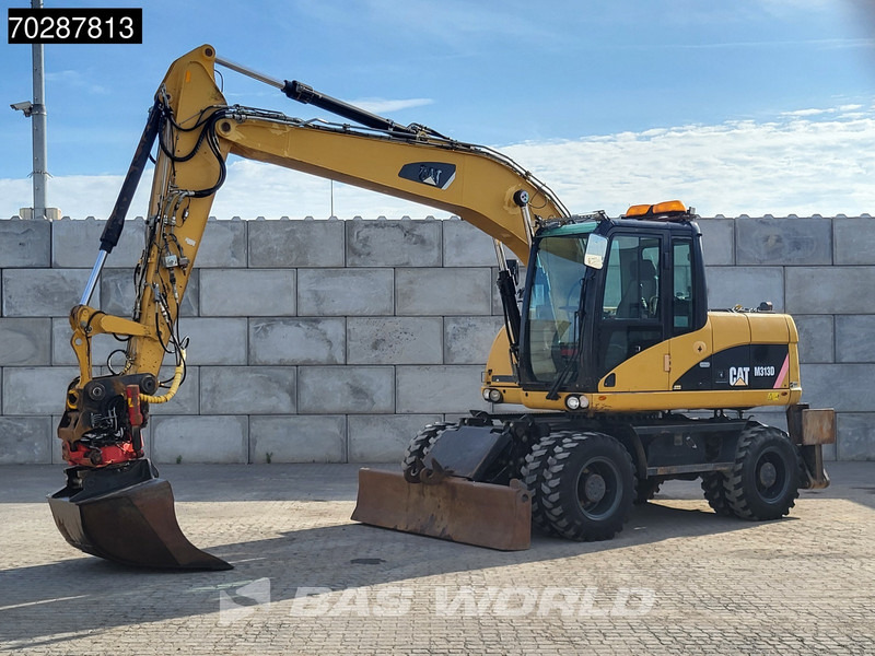 Caterpillar M313 D OUTRIGGERS + BLADE - Excavator pe roţi: Foto 2 Caterpillar M313 D OUTRIGGERS + BLADE - Excavator pe roţi: Foto 2