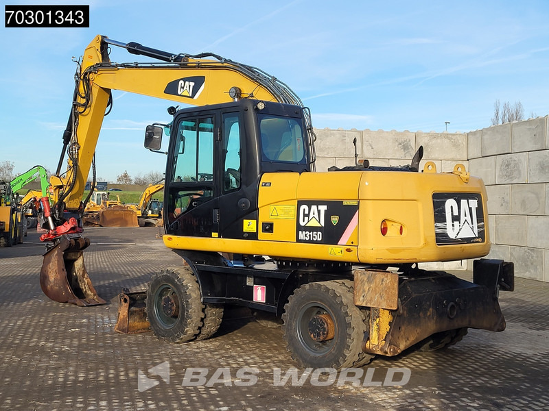 Caterpillar M315 D OUTRIGGERS + BLADE - Excavator pe roţi: Foto 5 Caterpillar M315 D OUTRIGGERS + BLADE - Excavator pe roţi: Foto 5