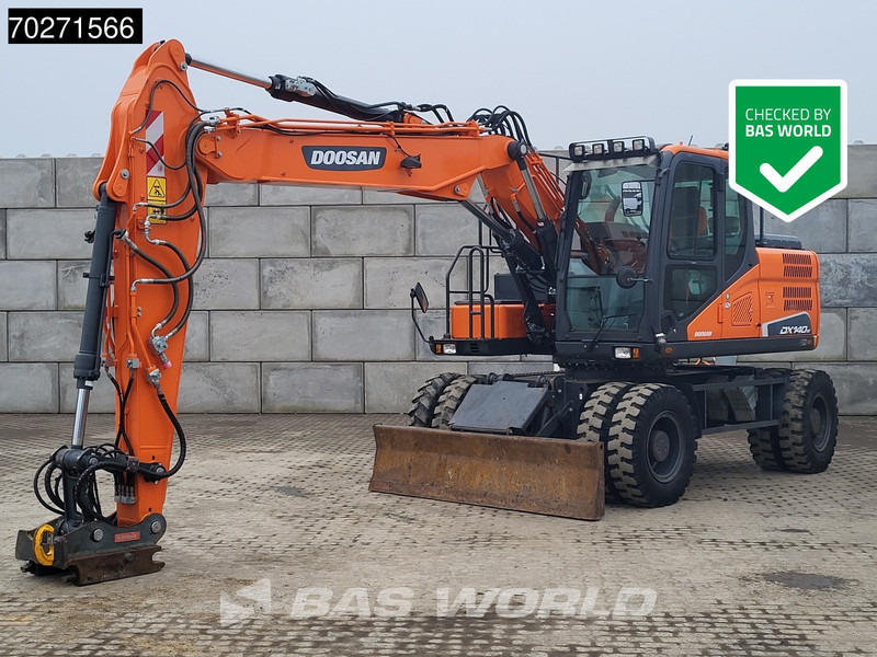 Doosan DX140 W-5 OIL QUICK - GERMAN - Excavator pe roţi: Foto 1 Doosan DX140 W-5 OIL QUICK - GERMAN - Excavator pe roţi: Foto 1