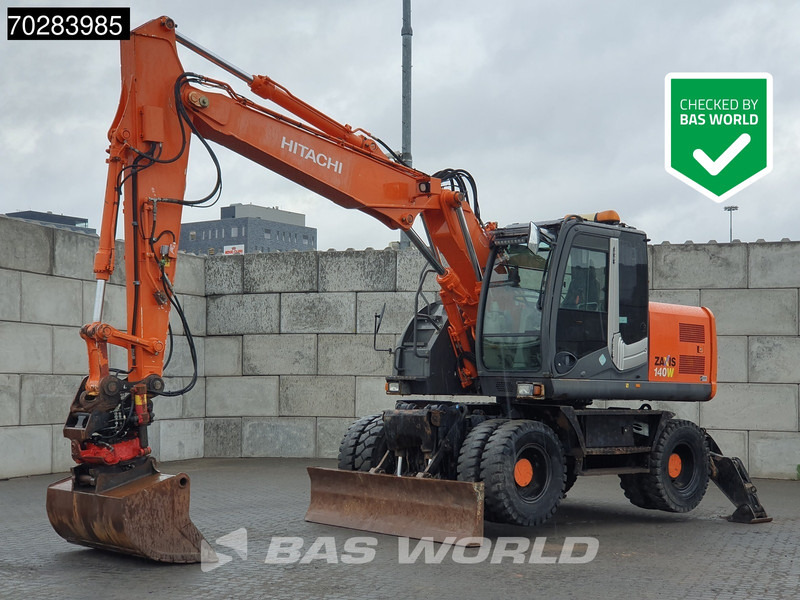 Hitachi ZX140W -3 OUTRIGGERS - ROTOTILT - Excavator pe roţi: Foto 1 Hitachi ZX140W -3 OUTRIGGERS - ROTOTILT - Excavator pe roţi: Foto 1