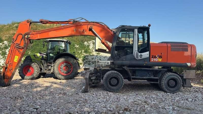 Hitachi ZX210W-3 - Excavator pe roţi: Foto 1 Hitachi ZX210W-3 - Excavator pe roţi: Foto 1