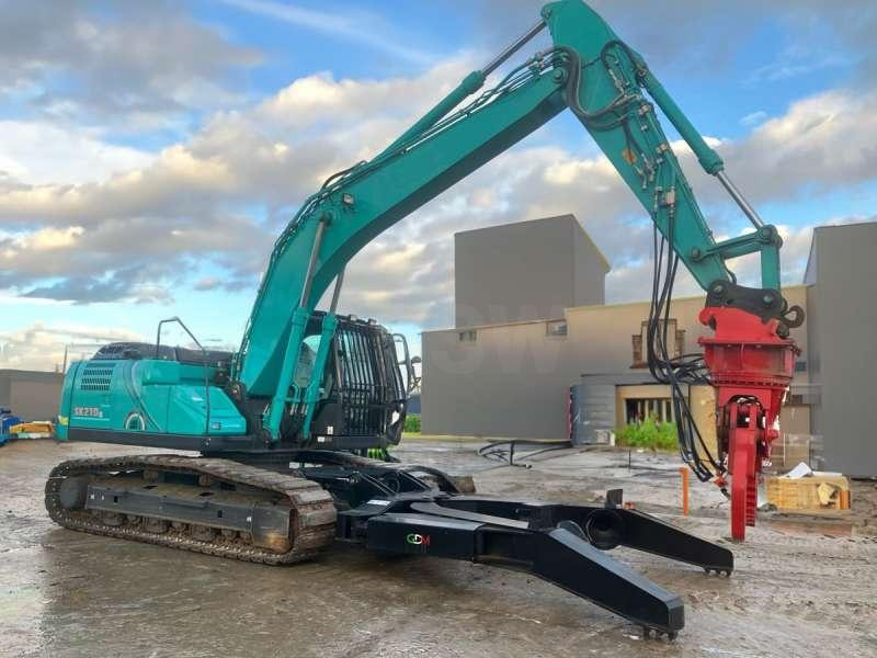 Kobelco SK210LC-10E - Excavator pentru manipulare de materiale: Foto 1 Kobelco SK210LC-10E - Excavator pentru manipulare de materiale: Foto 1