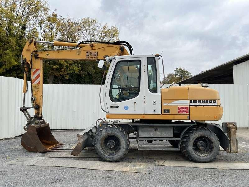 Liebherr A314 Litronic - Excavator pe roţi: Foto 3 Liebherr A314 Litronic - Excavator pe roţi: Foto 3