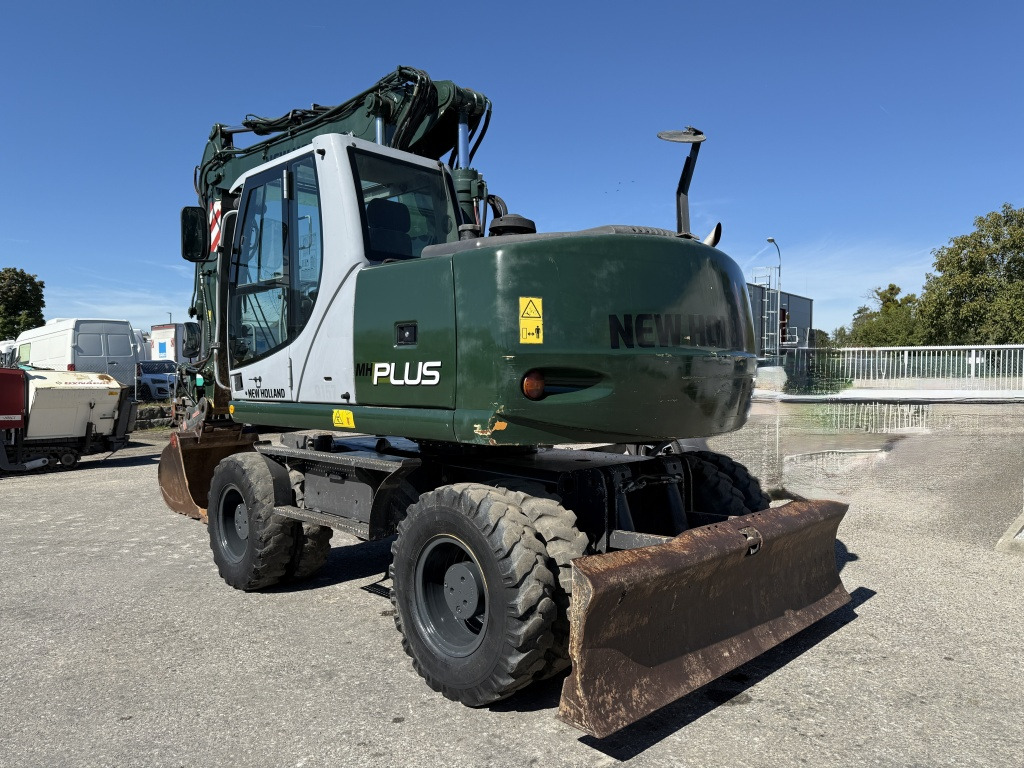 New Holland MH-Plus (111695) - Excavator pe roţi: Foto 4 New Holland MH-Plus (111695) - Excavator pe roţi: Foto 4