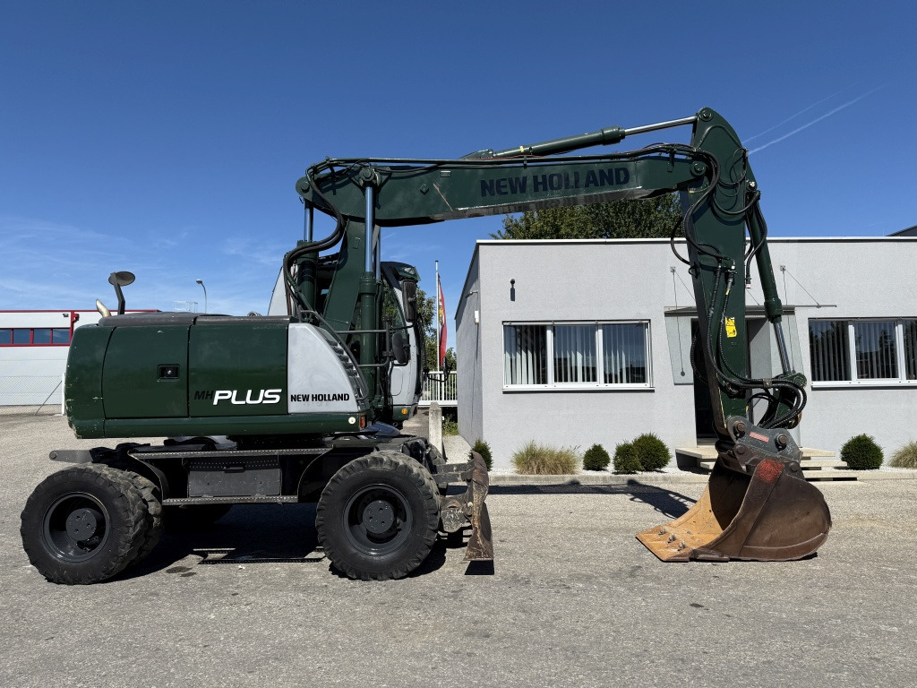 New Holland MH-Plus (111695) - Excavator pe roţi: Foto 5 New Holland MH-Plus (111695) - Excavator pe roţi: Foto 5