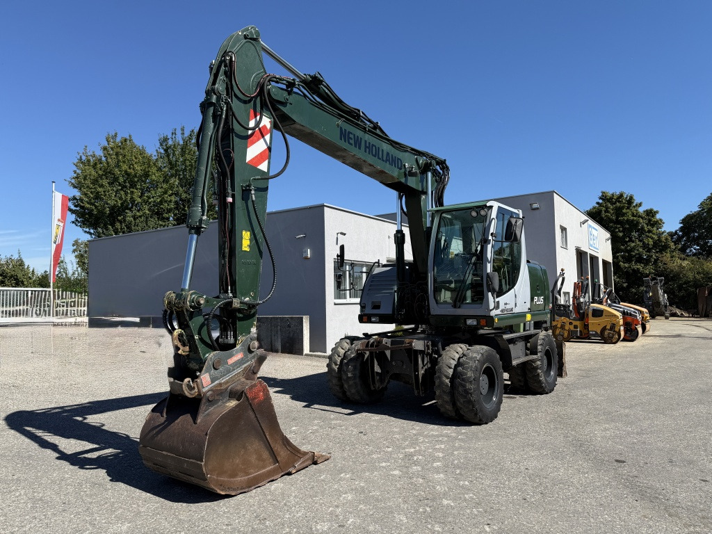 New Holland MH-Plus (111695) - Excavator pe roţi: Foto 3 New Holland MH-Plus (111695) - Excavator pe roţi: Foto 3