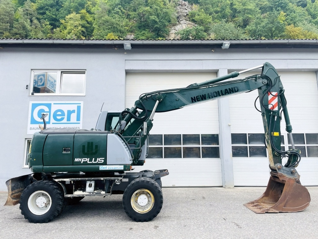 New Holland MH Plus (4054) - Excavator pe roţi: Foto 2 New Holland MH Plus (4054) - Excavator pe roţi: Foto 2
