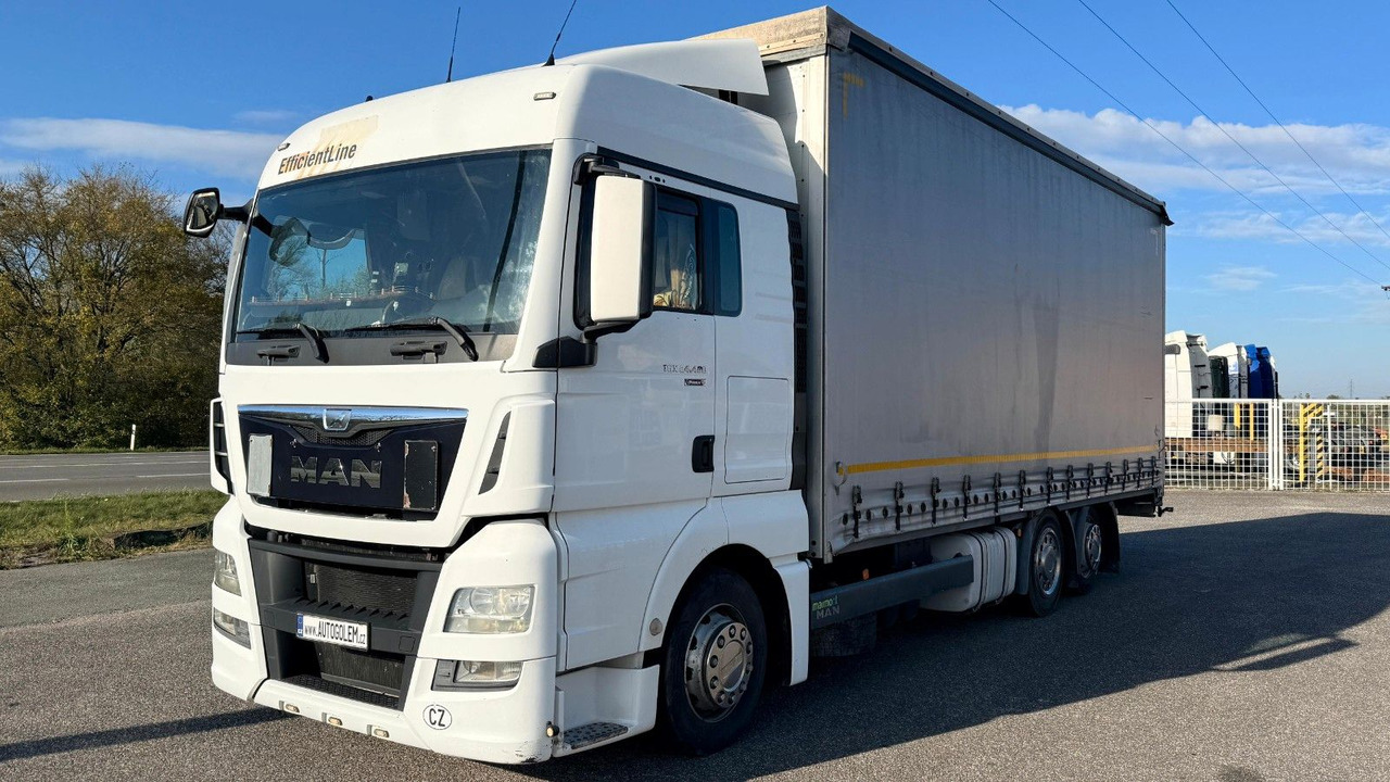 MAN TGX 24.480 - Camion cu prelată: Foto 1 MAN TGX 24.480 - Camion cu prelată: Foto 1