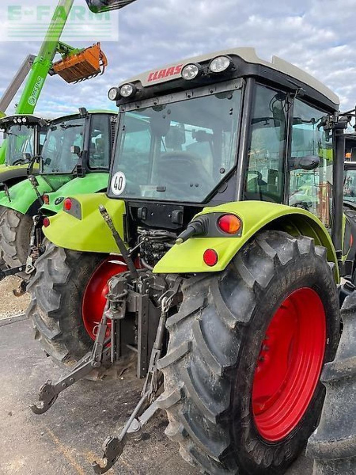 CLAAS axos 310 cl mit wendegetriebe + klima CL - Tractor agricol: Foto 4 CLAAS axos 310 cl mit wendegetriebe + klima CL - Tractor agricol: Foto 4
