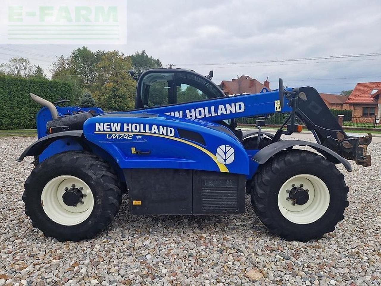 Încărcător frontal pe pneuri New Holland lm 7.42: Foto 12