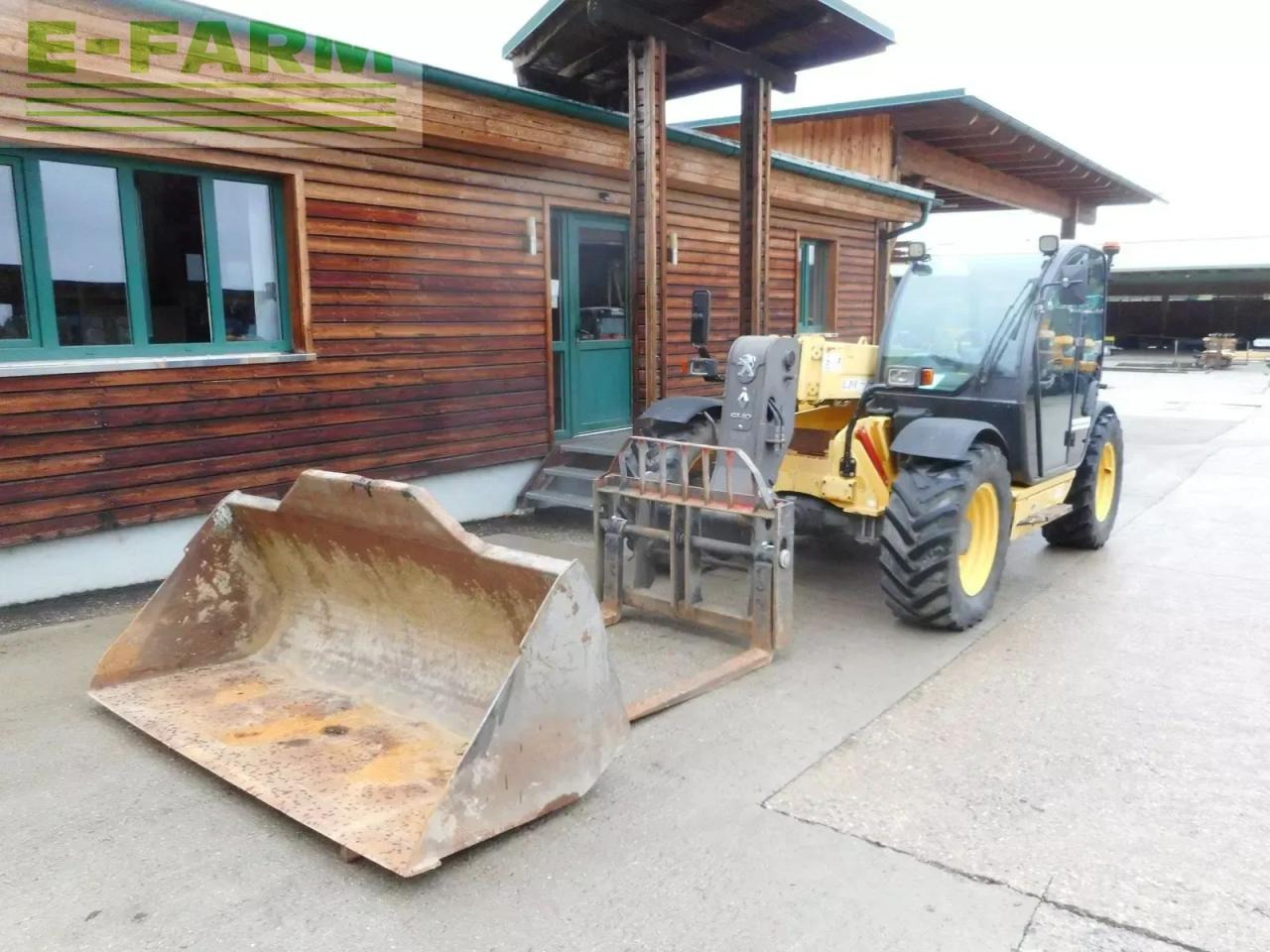 New Holland lm732 mit schaufel und gabel - Stivuitor telescopic: Foto 2 New Holland lm732 mit schaufel und gabel - Stivuitor telescopic: Foto 2