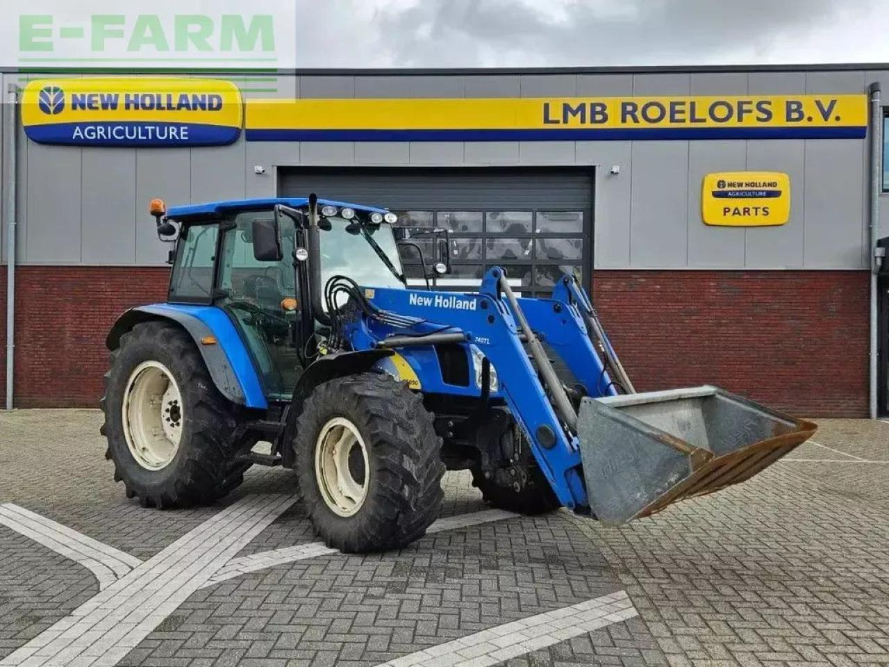 New Holland t5050 met frontlader - Tractor agricol: Foto 1 New Holland t5050 met frontlader - Tractor agricol: Foto 1