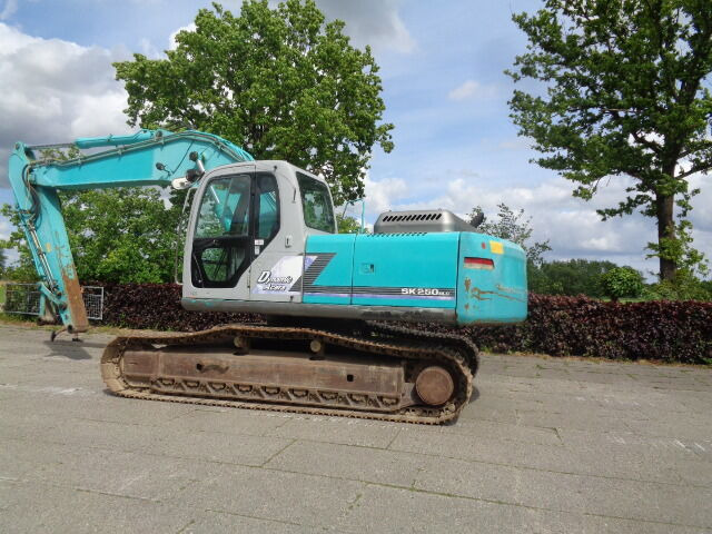 Kobelco SK250NLC - Excavator pe şenile: Foto 1 Kobelco SK250NLC - Excavator pe şenile: Foto 1