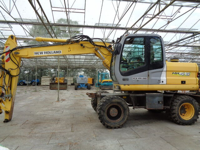 New Holland MH 4.6 - Excavator pe roţi: Foto 1 New Holland MH 4.6 - Excavator pe roţi: Foto 1