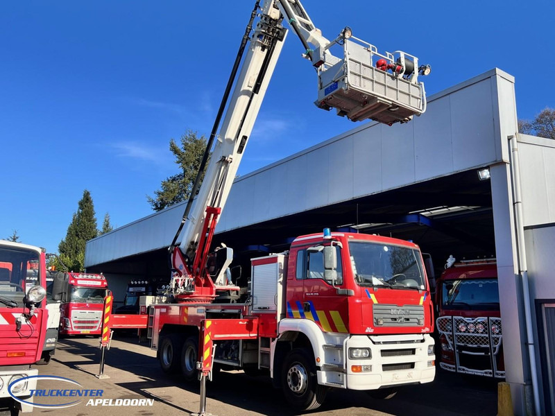 MAN TGA 26.350 Magirus ALP 320L = 32 meter, Waterpomp, 6x4, Bladgeveerd - Autospeciala de stins incendii: Foto 2 MAN TGA 26.350 Magirus ALP 320L = 32 meter, Waterpomp, 6x4, Bladgeveerd - Autospeciala de stins incendii: Foto 2