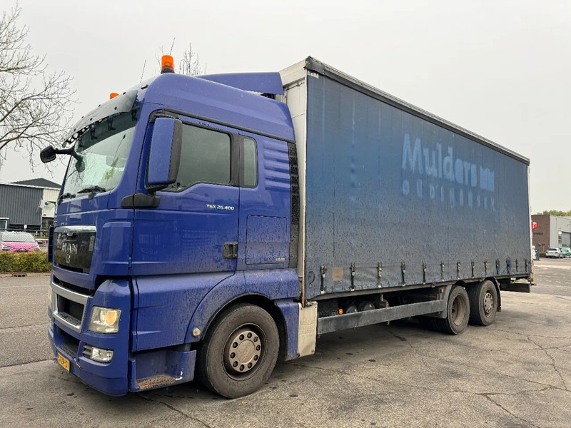 MAN TGX 26.400 6X2 - EURO 4 + LIFT + STEERING AXLE + TÜV 10-2025 - Camion cu prelată: Foto 1 MAN TGX 26.400 6X2 - EURO 4 + LIFT + STEERING AXLE + TÜV 10-2025 - Camion cu prelată: Foto 1