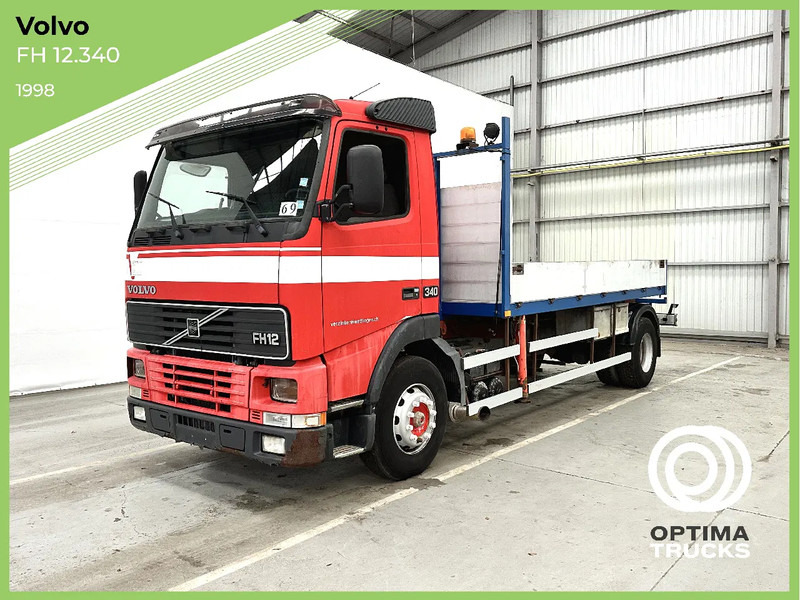 Volvo FH 12.340 BLAD-BLAD / LAMMES-LAMMES - EURO 2 - Camion cu prelată: Foto 1 Volvo FH 12.340 BLAD-BLAD / LAMMES-LAMMES - EURO 2 - Camion cu prelată: Foto 1