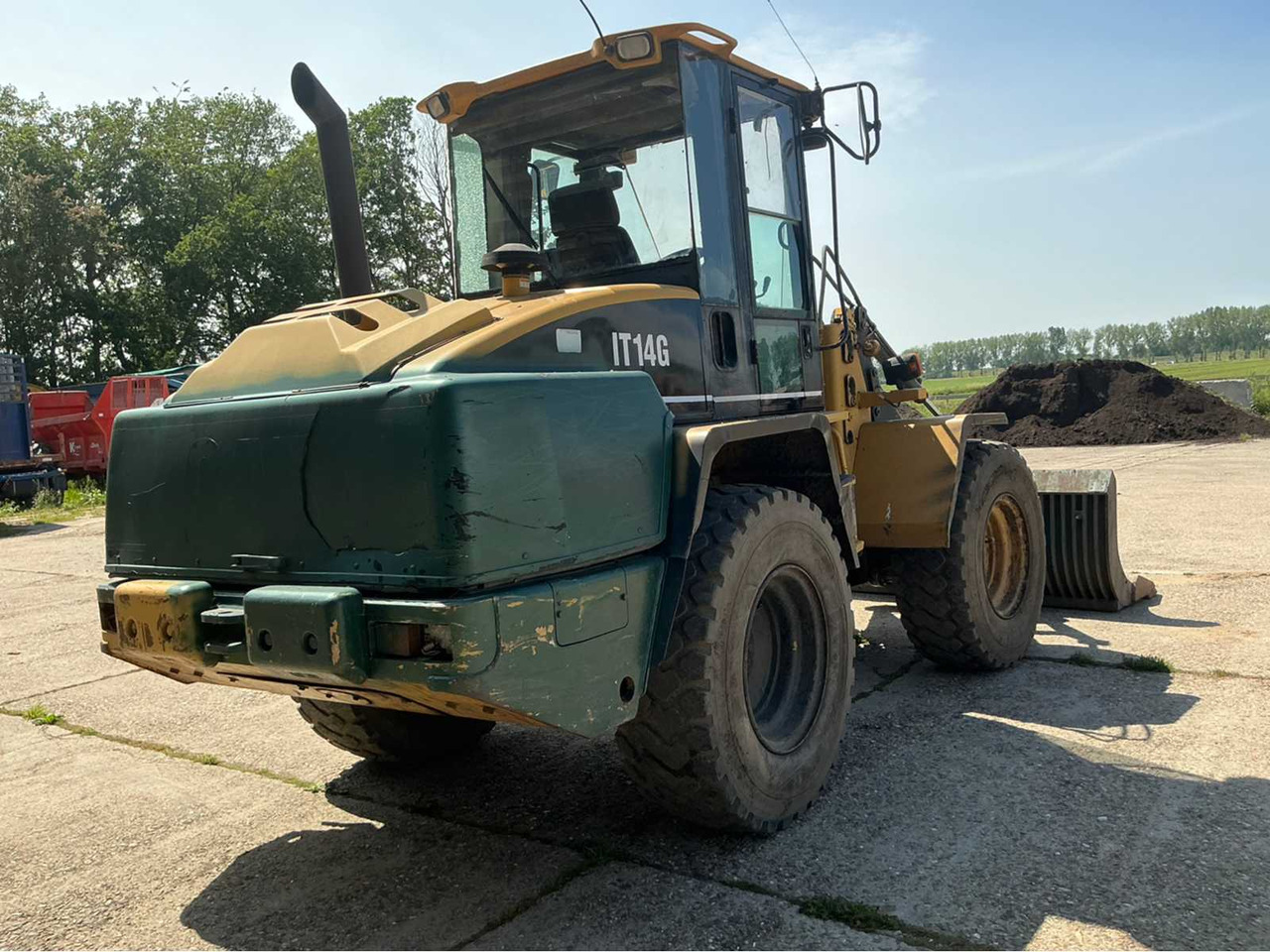 CAT IT140 - Încărcător frontal pe pneuri: Foto 5 CAT IT140 - Încărcător frontal pe pneuri: Foto 5