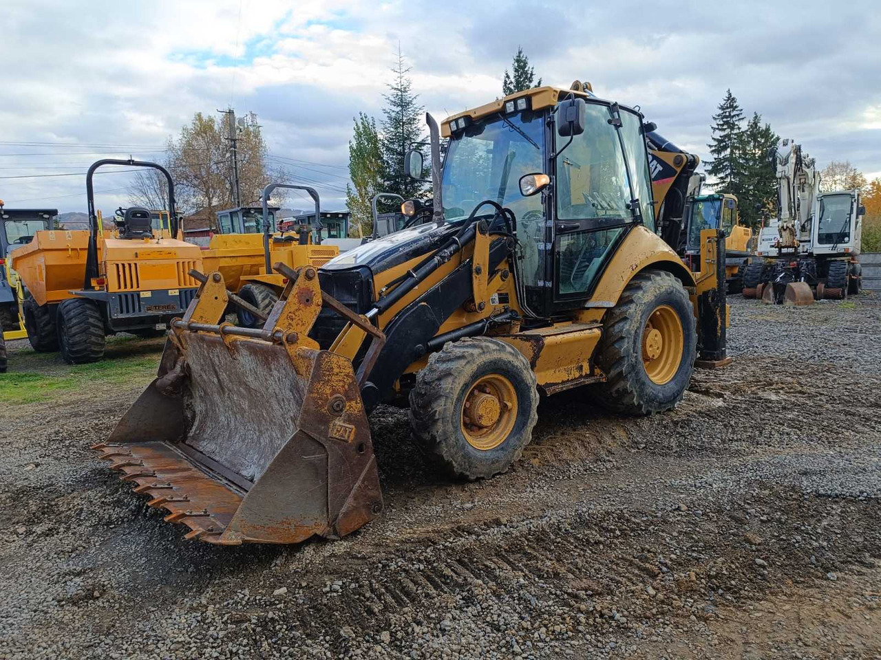 CATERPILLAR BACKHOE LOADER - Buldoexcavator: Foto 1 CATERPILLAR BACKHOE LOADER - Buldoexcavator: Foto 1