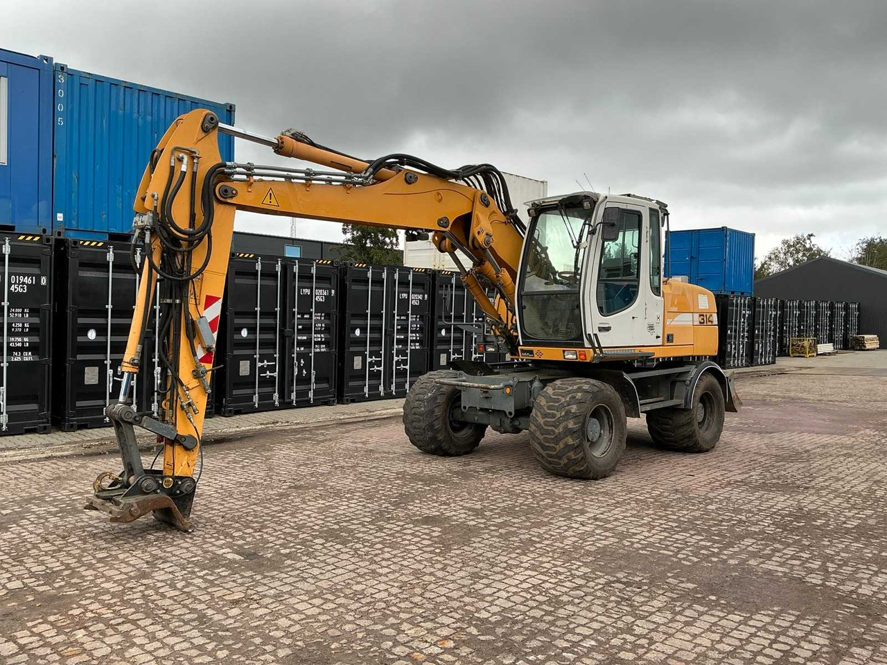 LIEBHERR A314 WHEELED EXCAVATOR - Excavator pe roţi: Foto 1 LIEBHERR A314 WHEELED EXCAVATOR - Excavator pe roţi: Foto 1