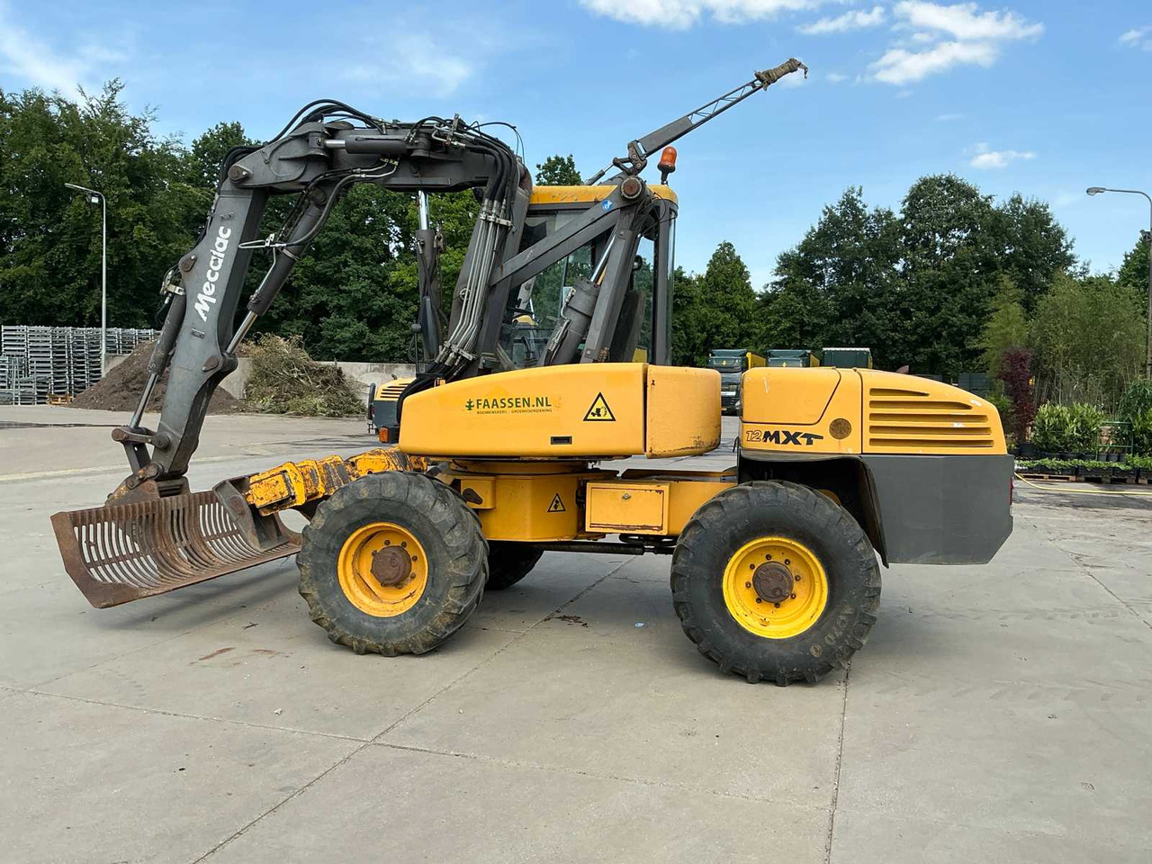 Mecalac 12MXT - Buldoexcavator: Foto 2 Mecalac 12MXT - Buldoexcavator: Foto 2