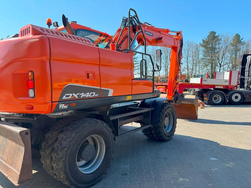 Doosan DX140-3 6000 uur ! NL Machine - Excavator pe roţi: Foto 4 Doosan DX140-3 6000 uur ! NL Machine - Excavator pe roţi: Foto 4