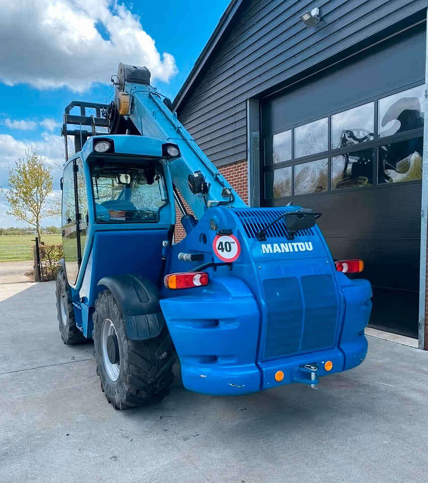 Manitou MHT 780 - Încărcător pe roți telescopic: Foto 4 Manitou MHT 780 - Încărcător pe roți telescopic: Foto 4