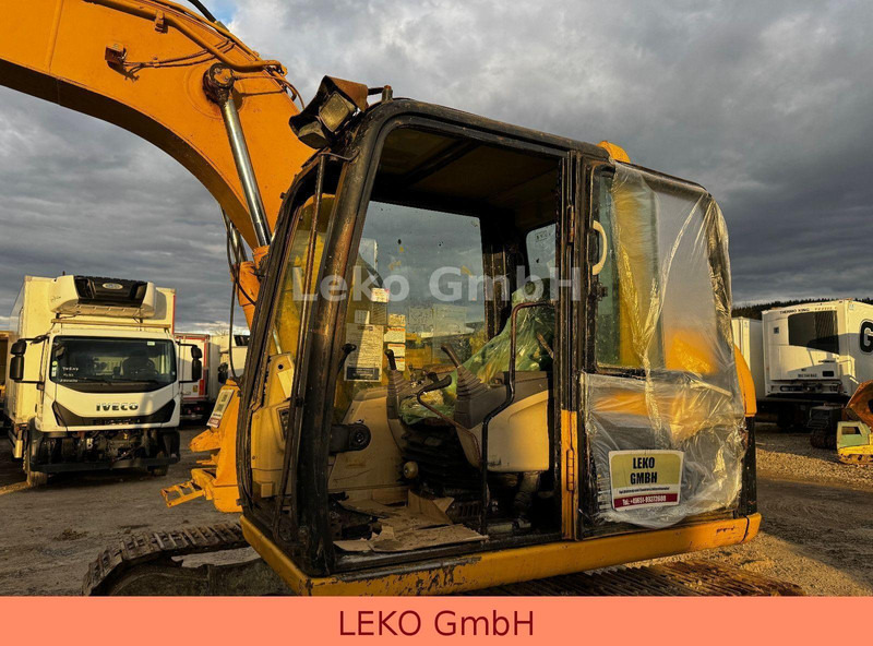Excavator pe şenile Caterpillar 311C Mit Zwei Löffeln: Foto 10 Excavator pe şenile Caterpillar 311C Mit Zwei Löffeln: Foto 10
