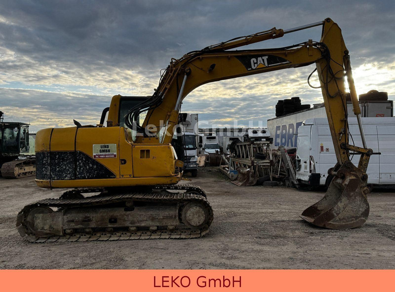 Excavator pe şenile Caterpillar 311C Mit Zwei Löffeln: Foto 8 Excavator pe şenile Caterpillar 311C Mit Zwei Löffeln: Foto 8