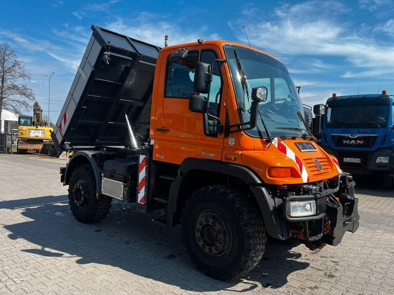 Mercedes-Benz UNIMOG U400 405/12 ZUGMASCHINE/ KIPPER - Autobasculantă: Foto 1 Mercedes-Benz UNIMOG U400 405/12 ZUGMASCHINE/ KIPPER - Autobasculantă: Foto 1
