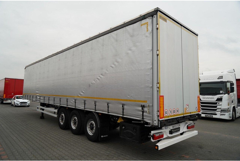 Wielton FIRANKA / STANDARD / OŚ PODNOSZONA / PLANDEKA ZBROJONA - Semiremorcă prelată: Foto 2 Wielton FIRANKA / STANDARD / OŚ PODNOSZONA / PLANDEKA ZBROJONA - Semiremorcă prelată: Foto 2