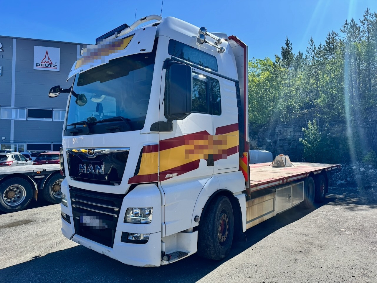 MAN TGX 580 - Camion platformă: Foto 1 MAN TGX 580 - Camion platformă: Foto 1