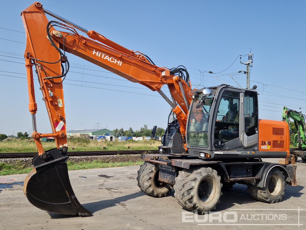 2009 Hitachi ZX140W-3 - Excavator pe roţi: Foto 1 2009 Hitachi ZX140W-3 - Excavator pe roţi: Foto 1