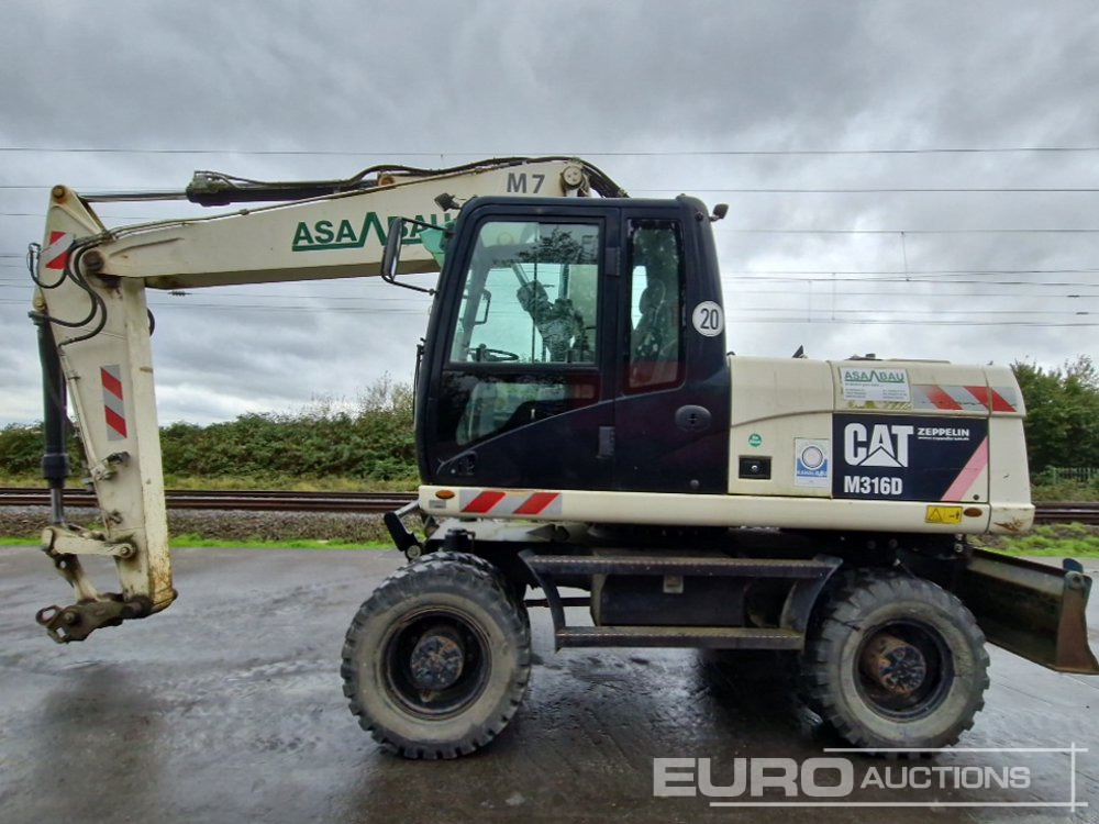 2011 CAT M316D - Excavator pe roţi: Foto 2 2011 CAT M316D - Excavator pe roţi: Foto 2
