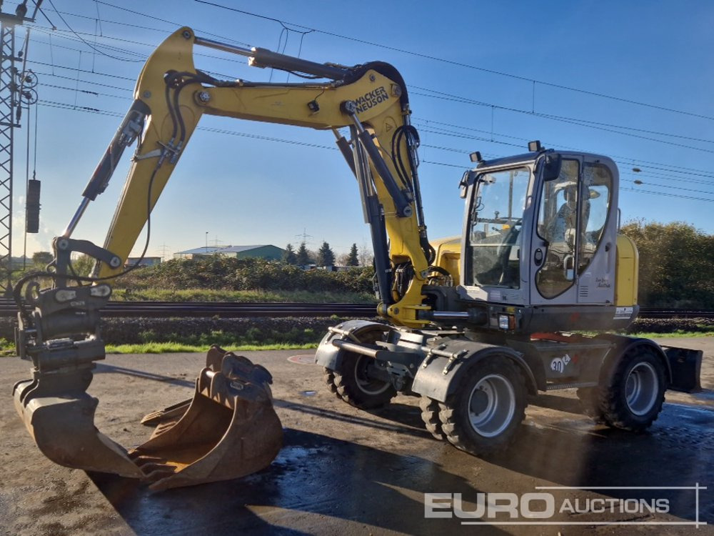 2019 Wacker Neuson EW100 - Excavator pe roţi: Foto 1 2019 Wacker Neuson EW100 - Excavator pe roţi: Foto 1