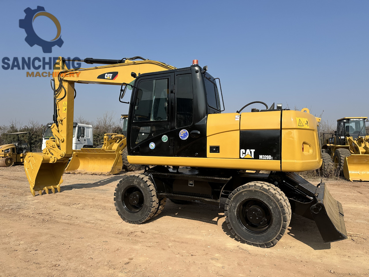 CATERPILLAR M320D2 - Excavator pe roţi: Foto 1 CATERPILLAR M320D2 - Excavator pe roţi: Foto 1