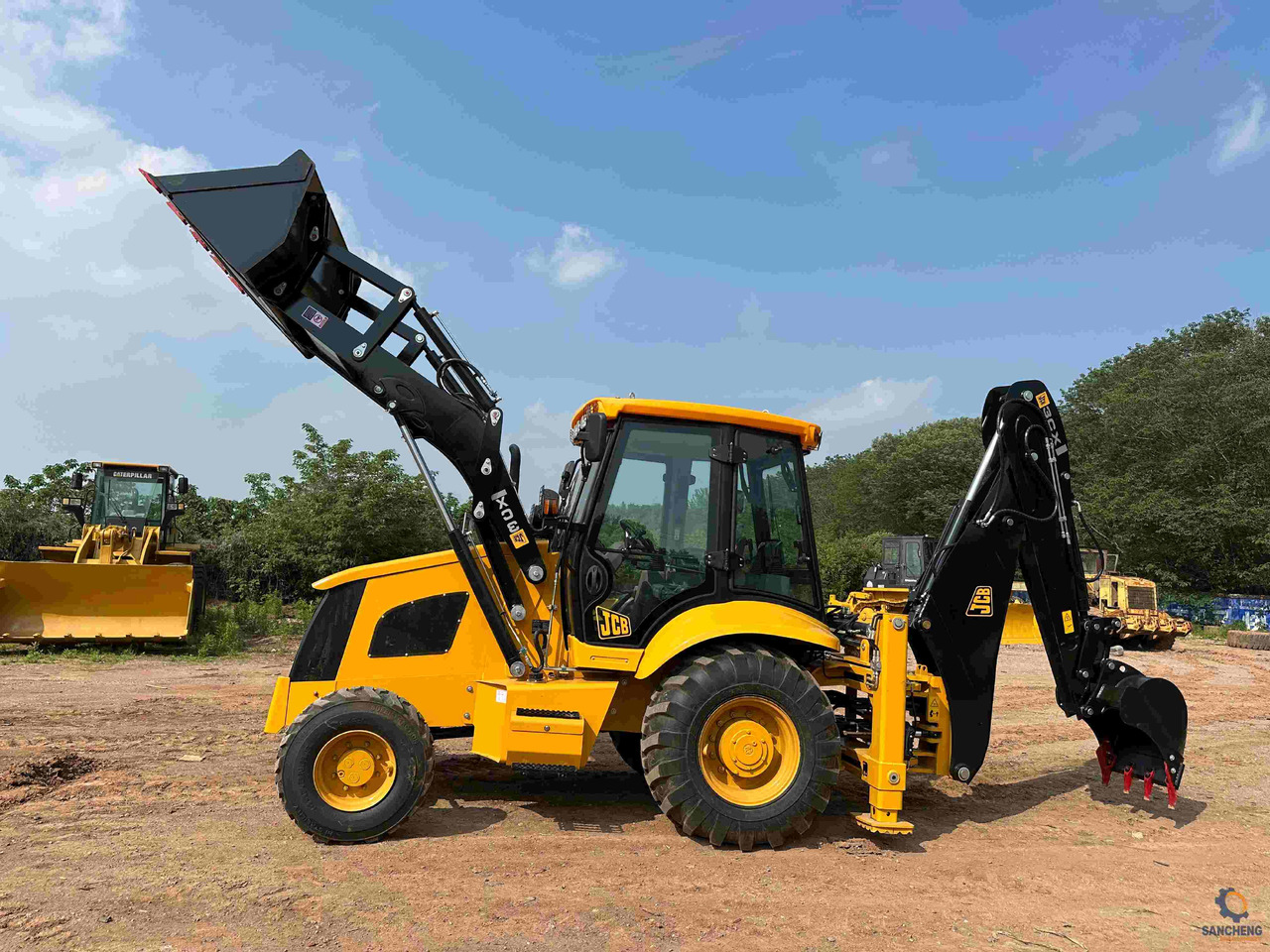 JCB 3CX - Buldoexcavator: Foto 1 JCB 3CX - Buldoexcavator: Foto 1