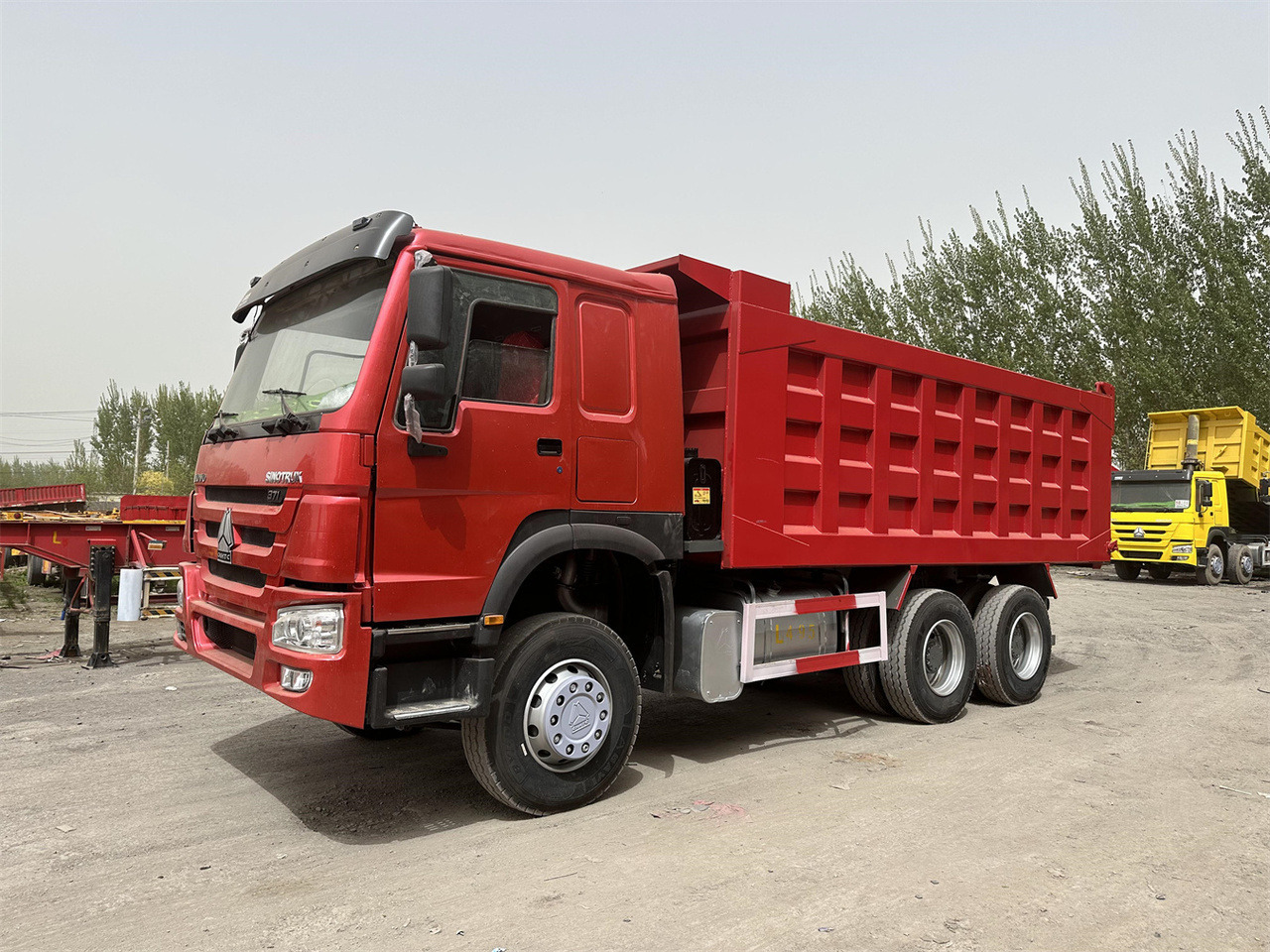 SINOTRUK Howo Dump truck 371 - Camion basculantă: Foto 1 SINOTRUK Howo Dump truck 371 - Camion basculantă: Foto 1