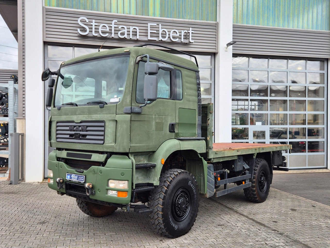 MAN TGA 18.360 4x4 BB Pritsche Single Bereifung - Camion platformă: Foto 1 MAN TGA 18.360 4x4 BB Pritsche Single Bereifung - Camion platformă: Foto 1