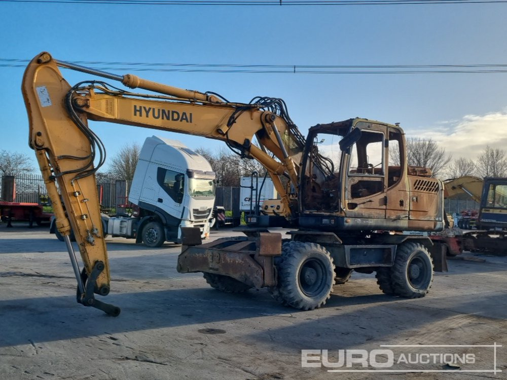 2013 Hyundai ROBEX140W-9 - Excavator pe roţi: Foto 1 2013 Hyundai ROBEX140W-9 - Excavator pe roţi: Foto 1