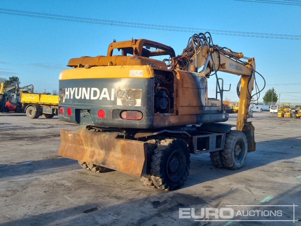 2013 Hyundai ROBEX140W-9 - Excavator pe roţi: Foto 5 2013 Hyundai ROBEX140W-9 - Excavator pe roţi: Foto 5