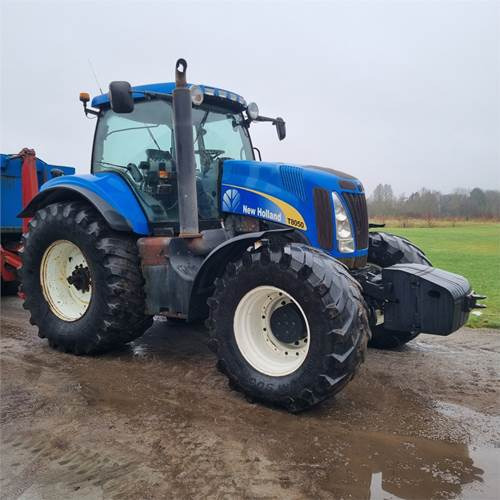 New Holland T8050 Class 5 - Tractor agricol: Foto 1 New Holland T8050 Class 5 - Tractor agricol: Foto 1