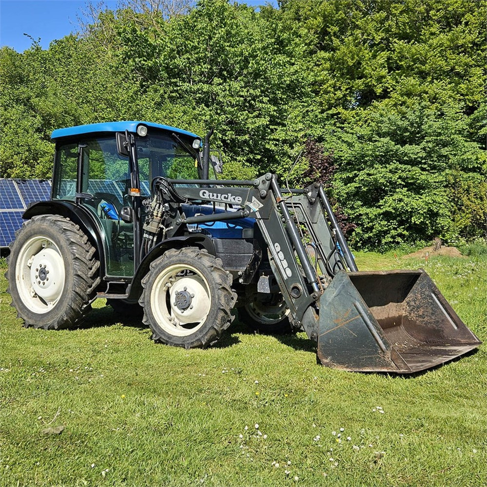 New Holland TN55D - Tractor agricol: Foto 1 New Holland TN55D - Tractor agricol: Foto 1