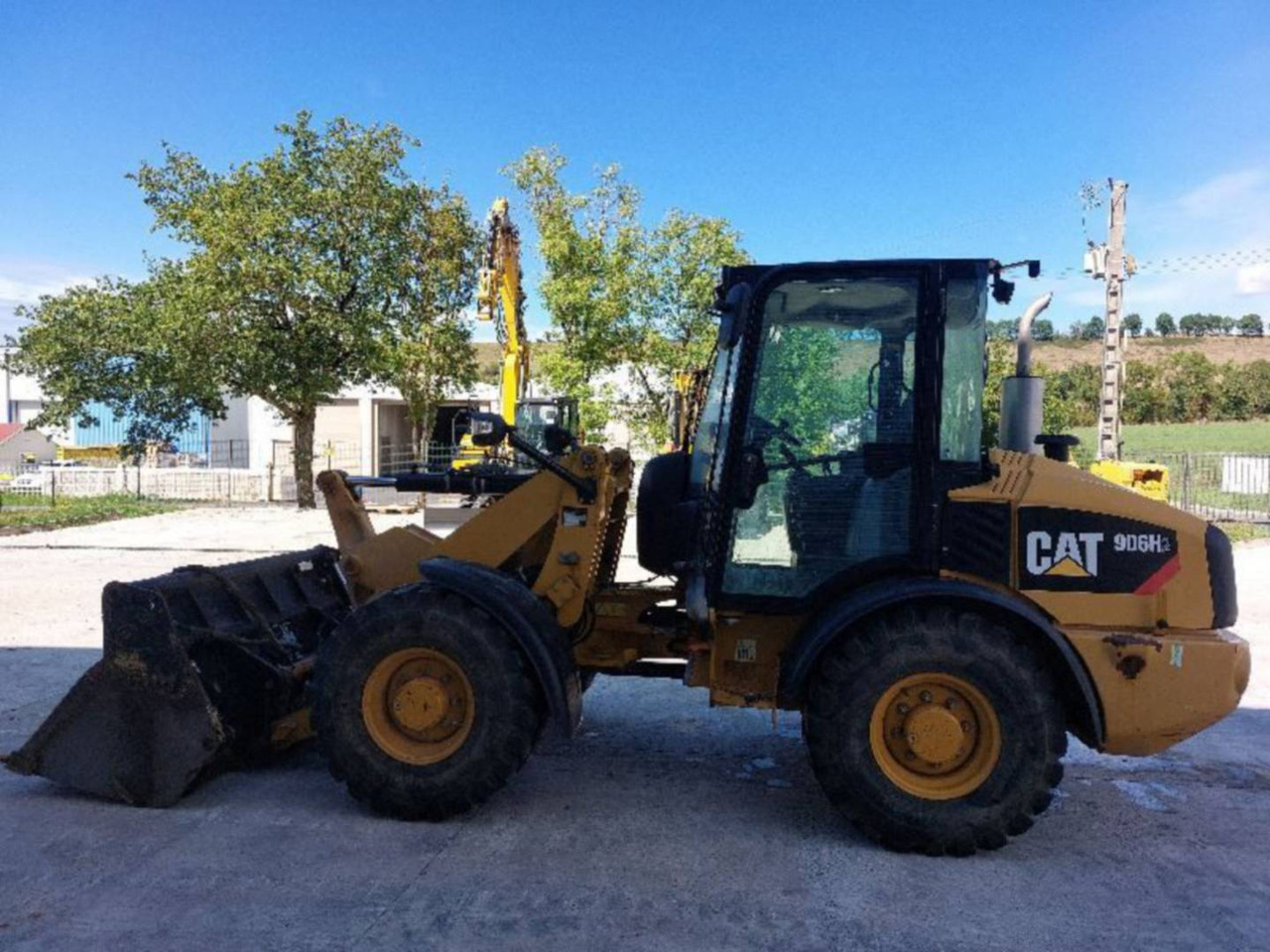 CAT 906H2 - Încărcător frontal pe pneuri: Foto 1 CAT 906H2 - Încărcător frontal pe pneuri: Foto 1