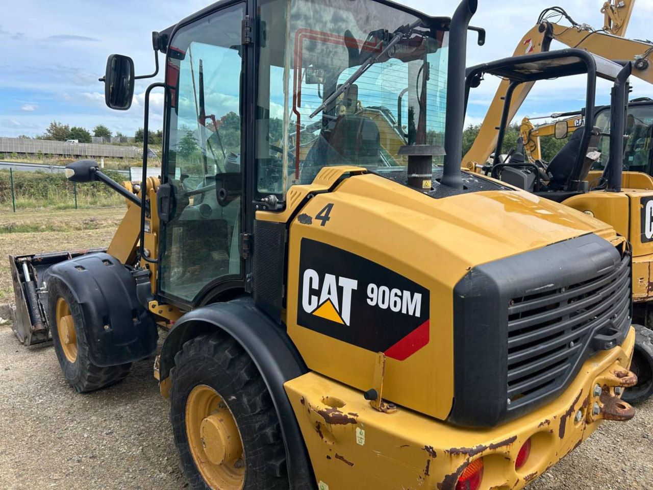 CAT 906M - Încărcător frontal pe pneuri: Foto 4 CAT 906M - Încărcător frontal pe pneuri: Foto 4