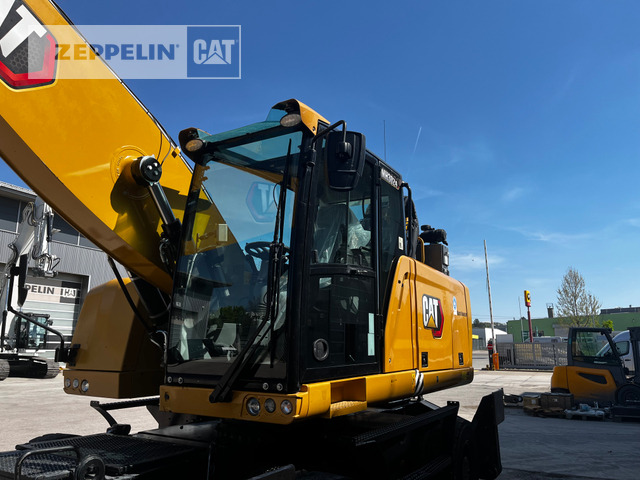 Excavator pentru manipulare de materiale Cat MH3024-06C: Foto 30