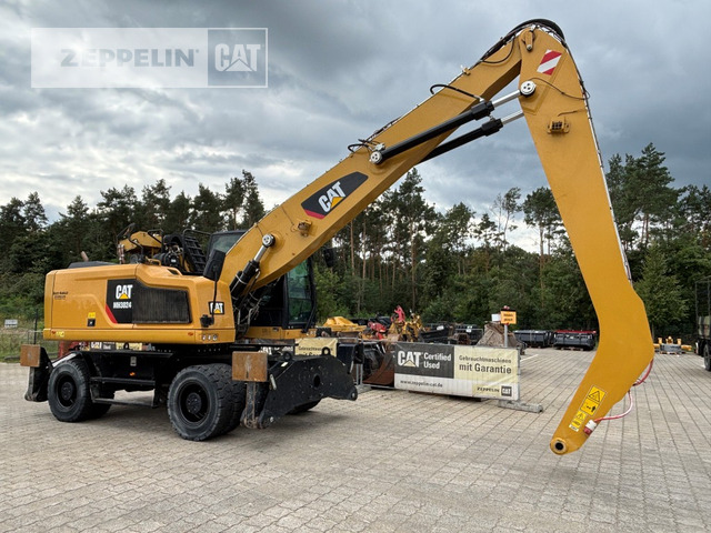Cat MH3024-06C - Excavator pentru manipulare de materiale: Foto 1 Cat MH3024-06C - Excavator pentru manipulare de materiale: Foto 1