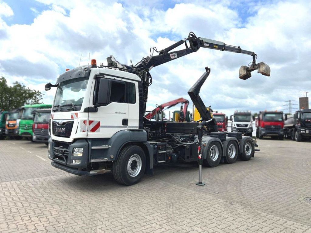 MAN TG-S 35.480 8x4 BL Abrollkipper mit Kran Penz-15 - Camion cu cârlig, Camion cu macara: Foto 1 MAN TG-S 35.480 8x4 BL Abrollkipper mit Kran Penz-15 - Camion cu cârlig, Camion cu macara: Foto 1